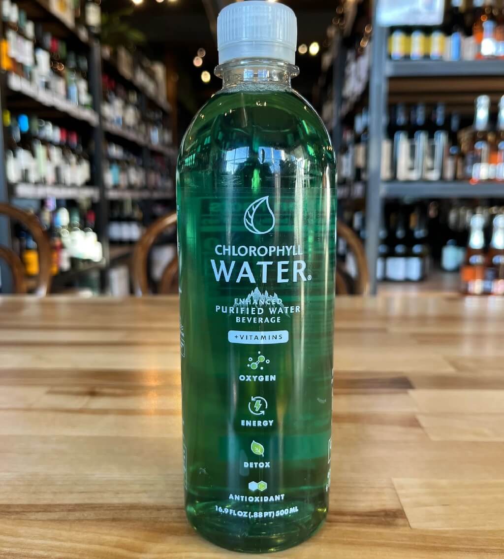 Bottled Chlorophyll Water with label showing benefits like oxygenation and energy